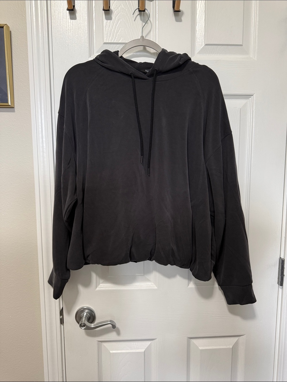 Athleta Seasoft Bubble hem hooded sweatshirt in soft black Sz XL